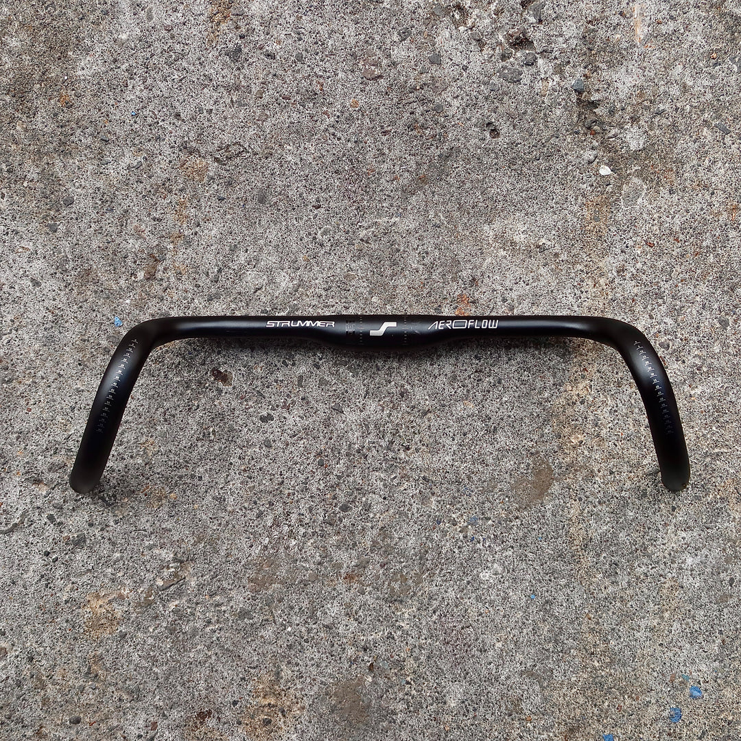 Strummer aeroflow với sỏi Flare Alloy Drop Bar
