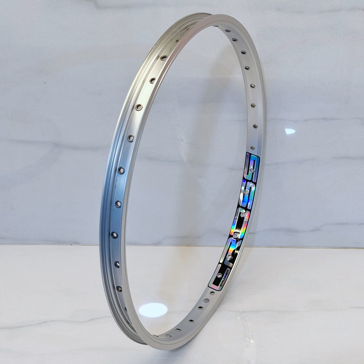 Rim Strummer Cross 20 inch Eyelet Anodize Silver, decal Oil Slick